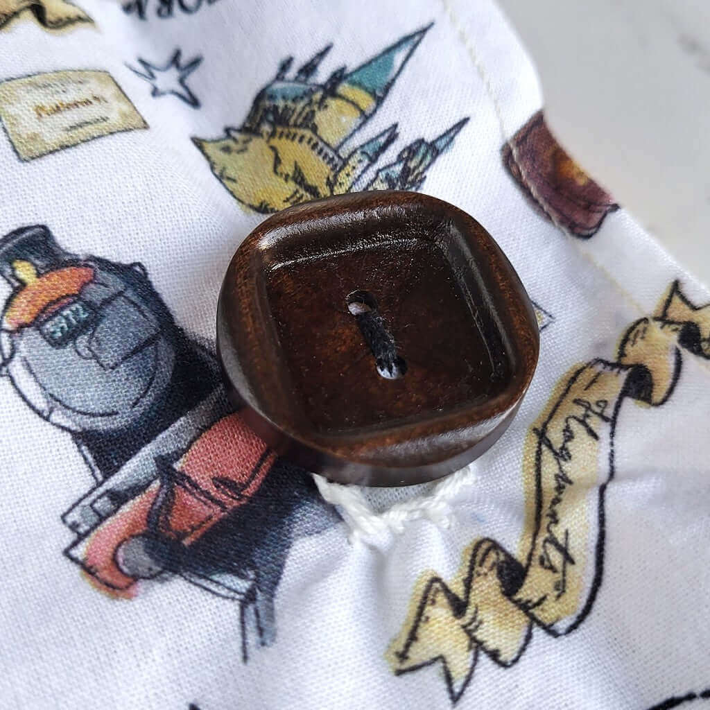 Cuscino benessere in cotone per cervicale, con noccioli di ciliegia.