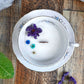 Candela in cera di soia in una tazza di porcellana Bavaria.