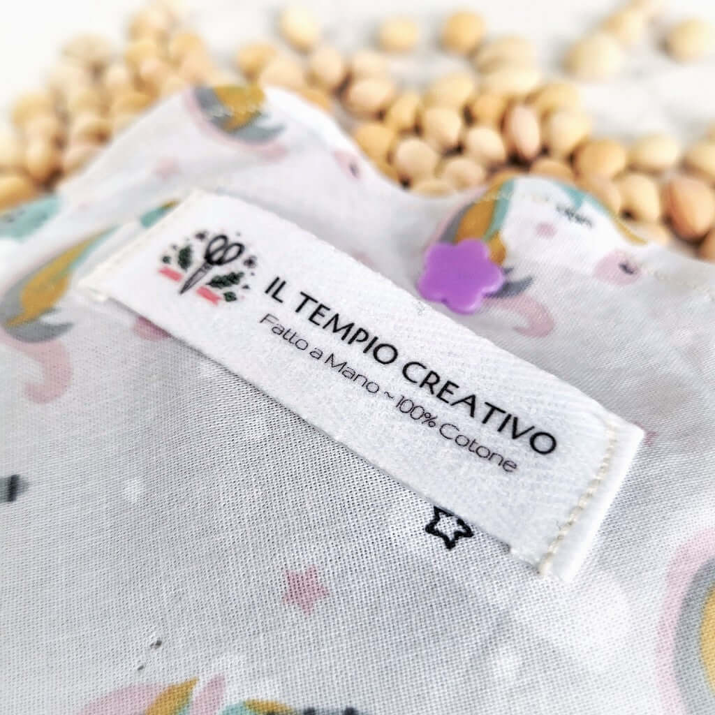 Cuscino termico per coliche bimbi bambini neonati e neo mamme, in puro cotone 100%, sfoderabile e lavabile, con noccioli di ciliegia. Fantasia Unicorno