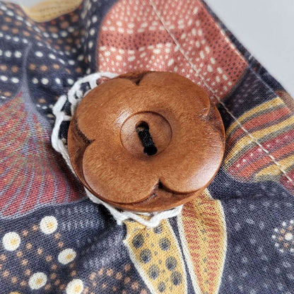 Cuscino benessere termico in cotone per cervicale, con noccioli di ciliegia.
